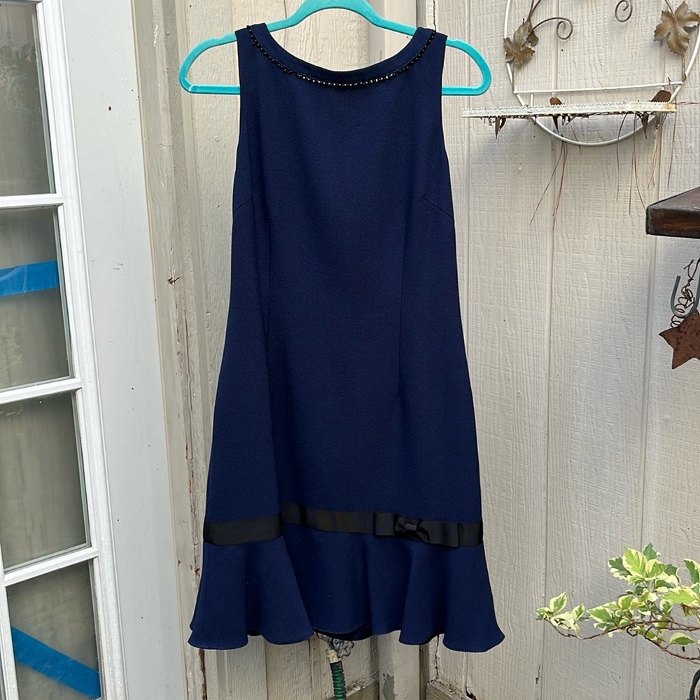 Karl Lagerfeld Paris women’s navy blue crew neck with blue beads, sleeveless,
